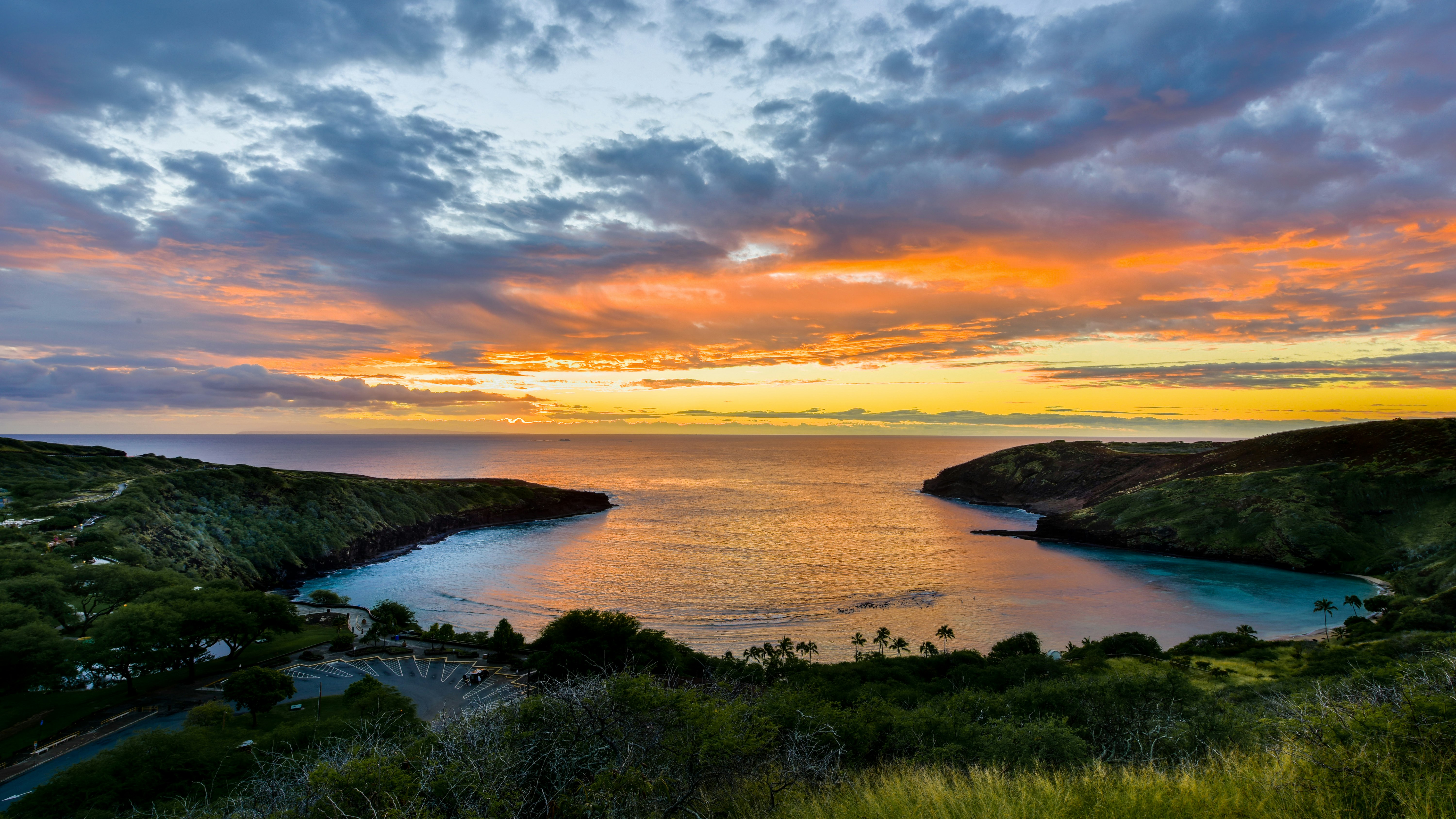 body of water during golden hour